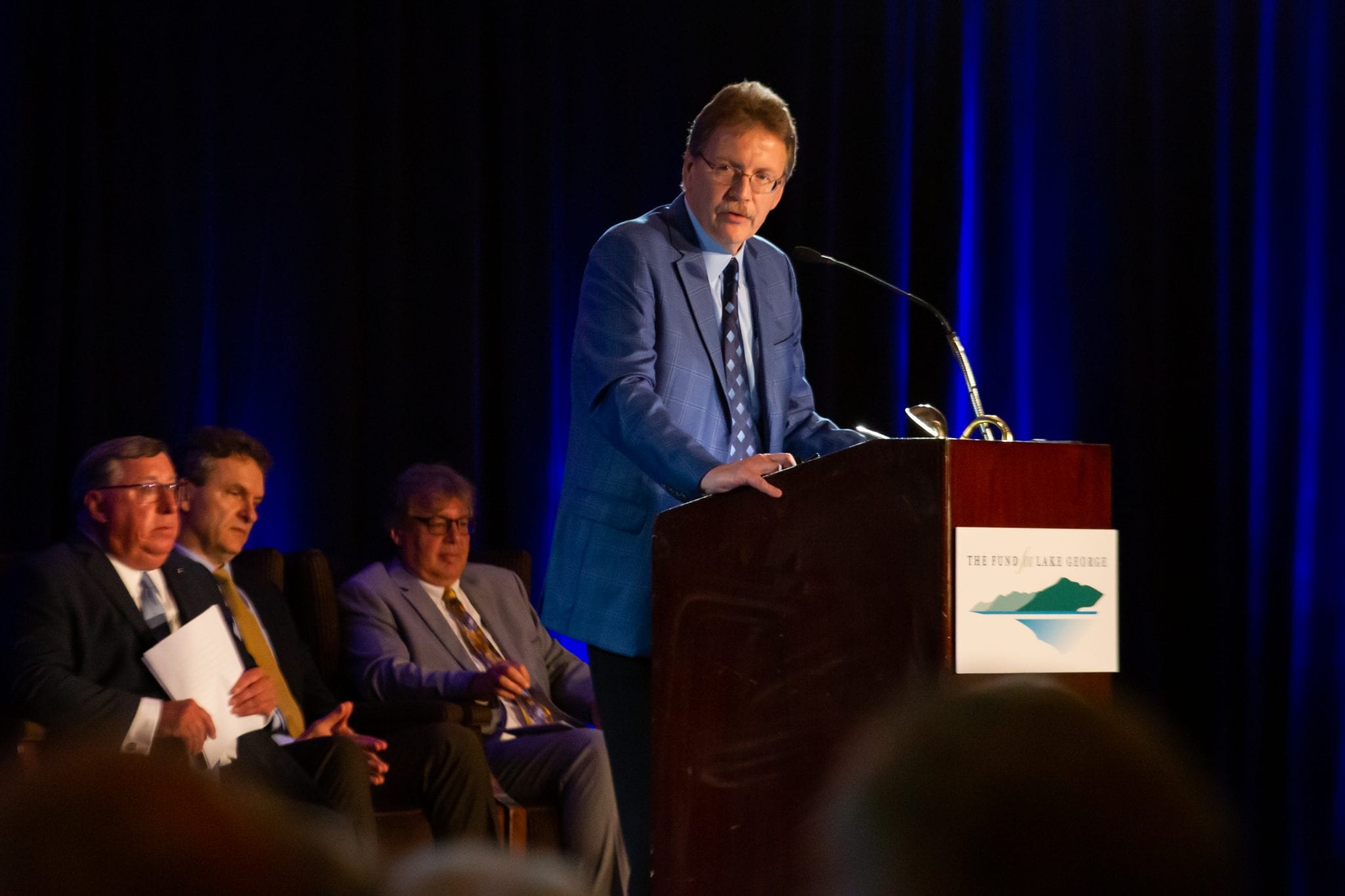 John E. Kelly, III, the executive vice president of IBM, speaks at the annual meeting of the Fund for Lake George July 6.