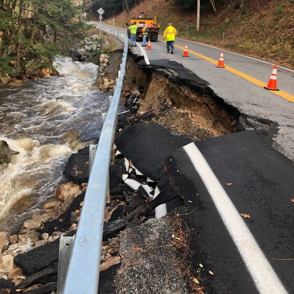 Flooding and high winds knock out power, close roads in the Adirondacks