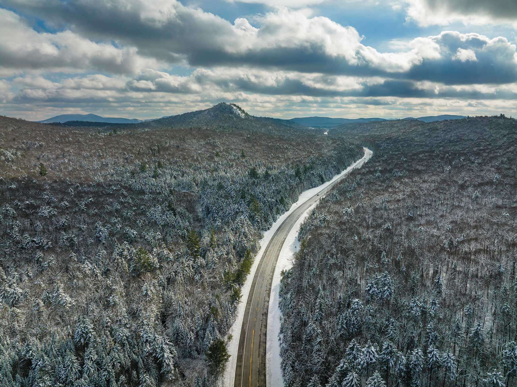 An aerial shot of Coney Mountain in winter