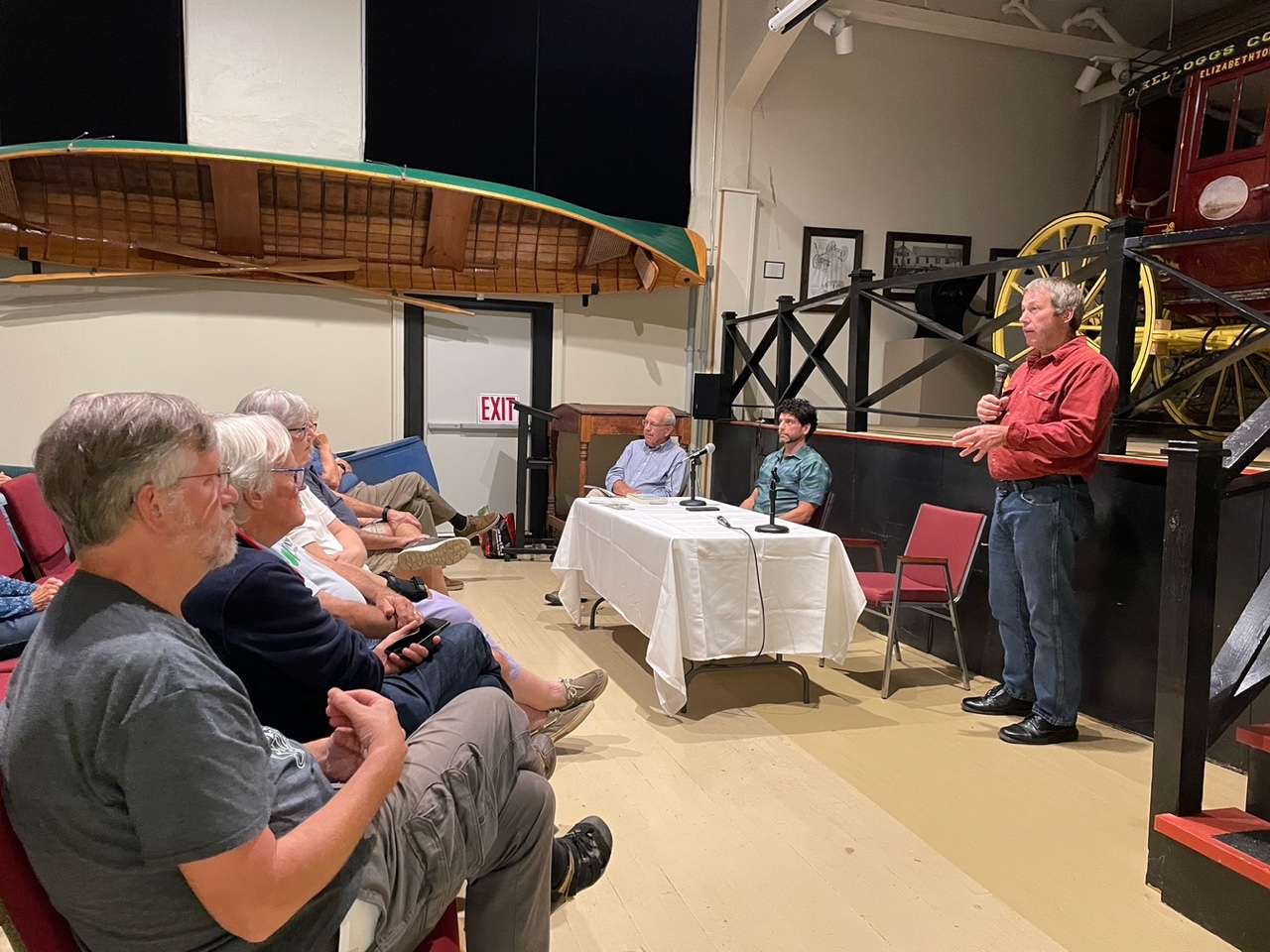 people at an indoor event in an auditorium