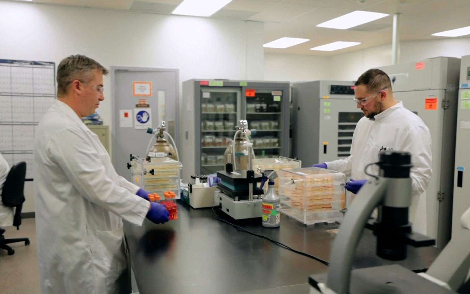 two men in lab coats