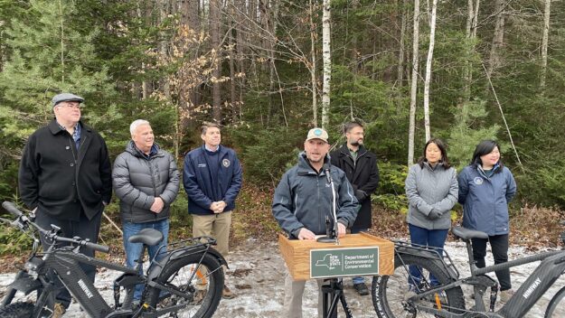 DEC Commissioner Basil Seggos announces the opening of the rail trail between Saranac Lake and Lake Placid. Photo by Mike Lynch