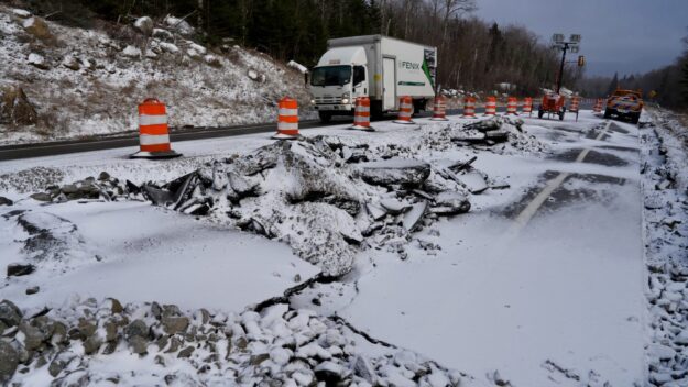 vehicles on snow-covered road