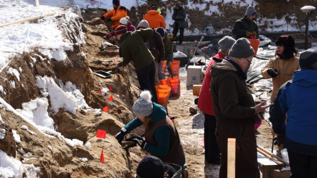 Volunteers work on history dig site in Lake George