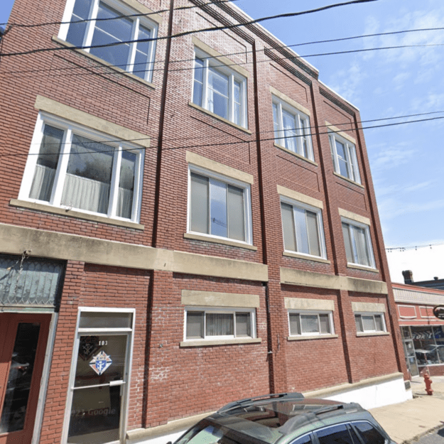 three story brick building that's owned by the knights of columbus in Ticonderoga