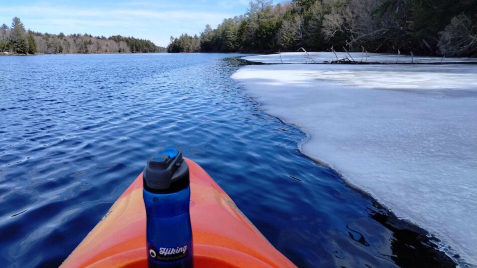 icy bank of oswegatchie in wanakena on mid-March paddle