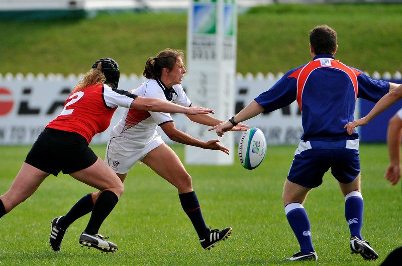 Claudia Braymer playing rugby