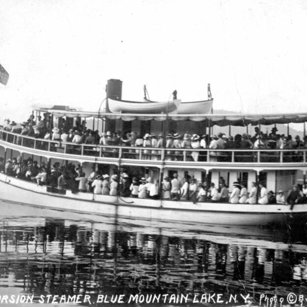 The Tuscarora sailing on a Blue Mountain Lake outing.