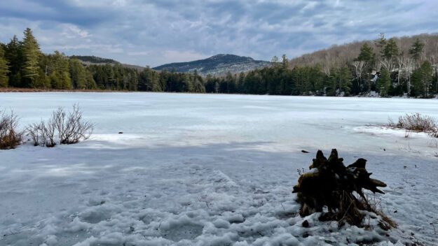 Spectacle Pond with Desolate Hill in the background.