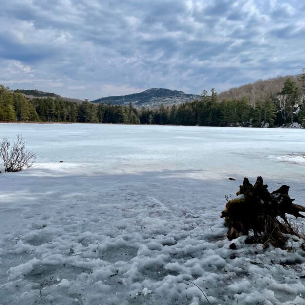 Spectacle Pond with Desolate Hill in the background.