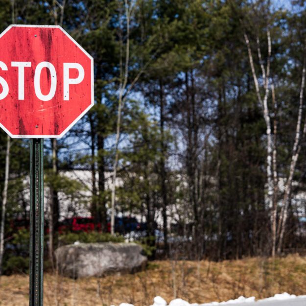 A stop sign near the WhistlePig facility in Mineville shows black staining.