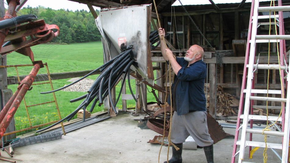 artist ted cornell at work on his art farm