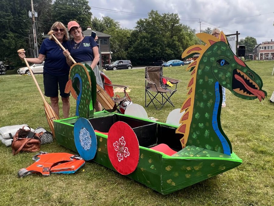 Cardboard Boat Race participants show off their vessel at a past race. Photo by Jason Smith