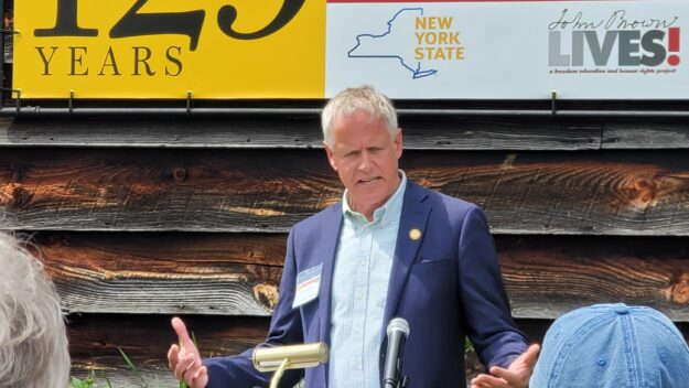 Erik Kulleseid speaks at John Brown's Farm in Lake Placid in 2021. Photo courtesy of state parks.