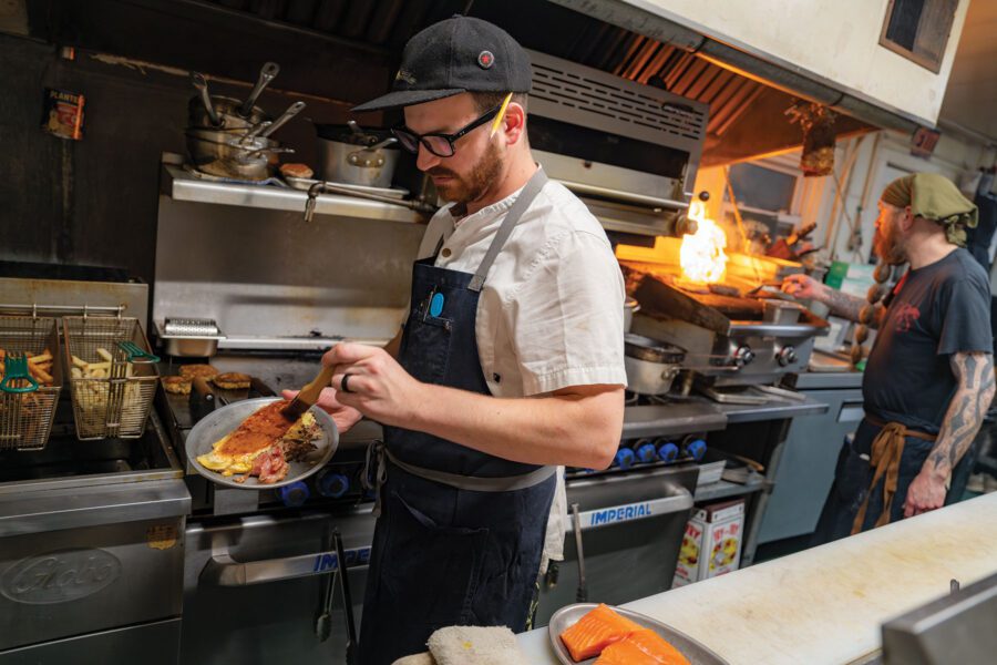 man cooking in a kitchen