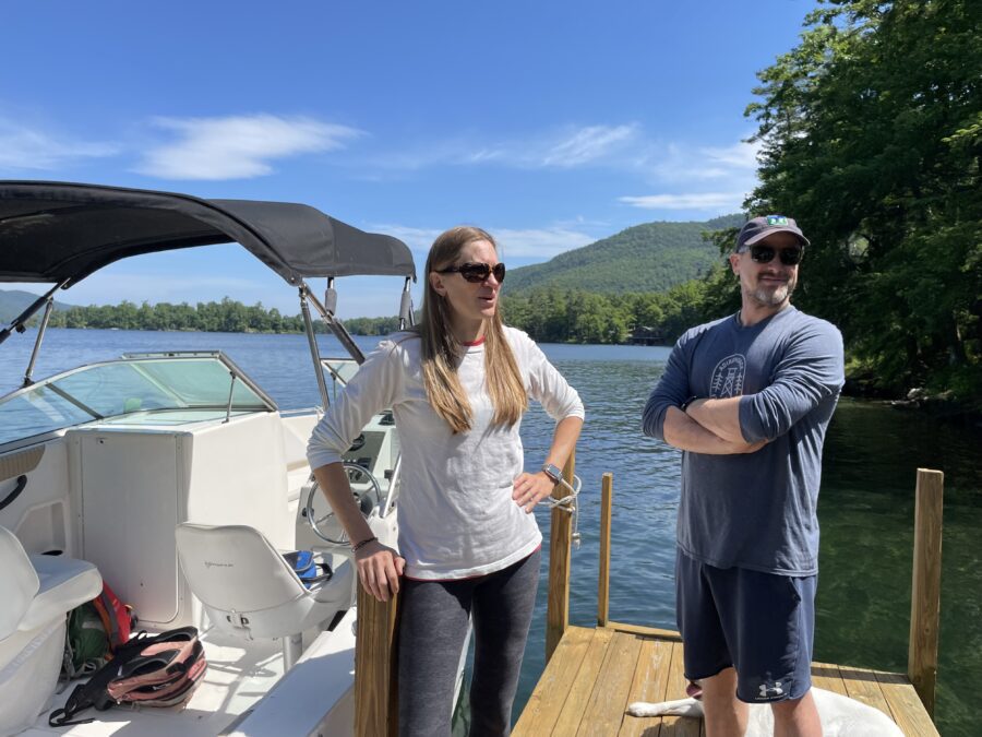 Jillian and Mike Maginnis standing on their dock in Sheep Meadow Bay, where the Lake George Park Commission plans to pilot the use of the herbicide ProcellaCOR.
