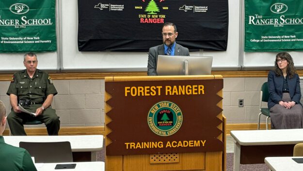 Interim DEC Commissioner Sean Mahar speaking to New York State Forest Ranger Recruits during their Swearing In Ceremony on June 7 at the SUNY ESF Ranger School in Wanakena. Nine recruits, including two ESF Ranger School graduates, will receive training in wildfire management, various rescue scenarios, fighting wildland fires, and backcountry survival.