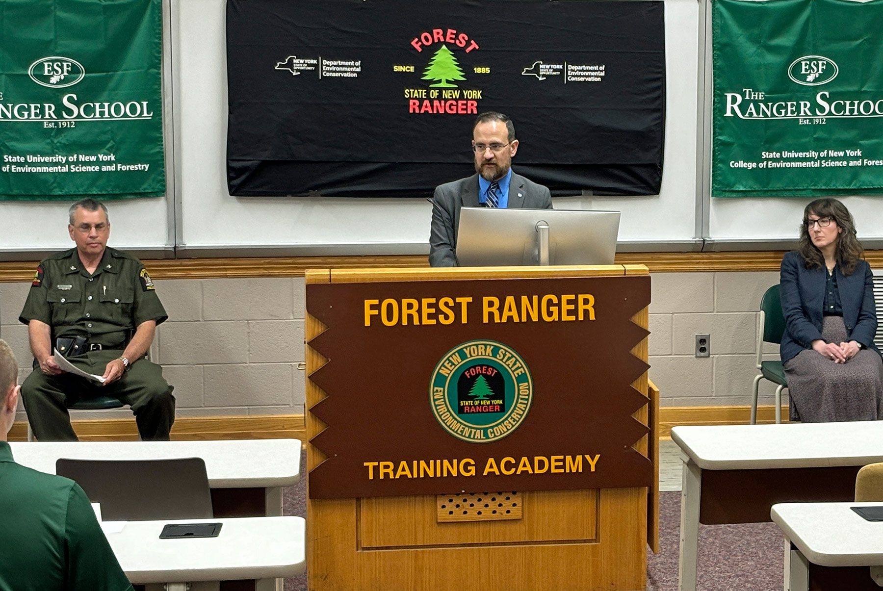 Interim DEC Commissioner Sean Mahar speaking to New York State Forest Ranger Recruits during their Swearing In Ceremony on June 7 at the SUNY ESF Ranger School in Wanakena. Nine recruits, including two ESF Ranger School graduates, will receive training in wildfire management, various rescue scenarios, fighting wildland fires, and backcountry survival.