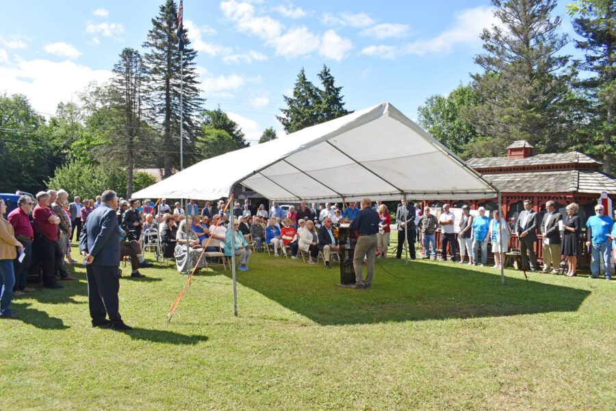 Tom Sauter, Chairperson of the Clifton-Fine Hospital Board, addresses close to 100 people attending the groundbreaking ceremony on July 1 for a new Emergency Room wing at the hospital in Star Lake.
