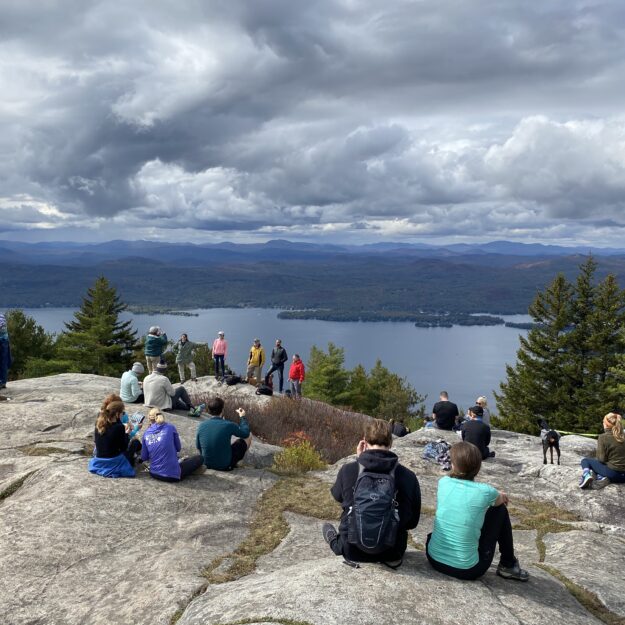 Hikers on Buck Mountain in Fort Ann overlooking Lake George on an October day in 2020.