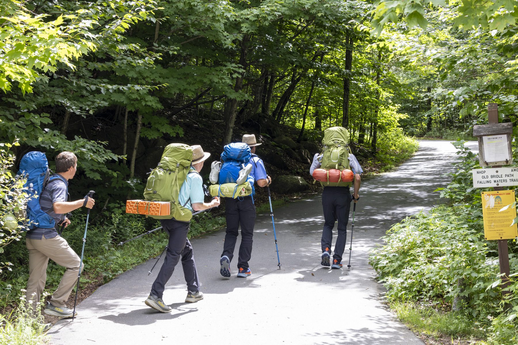 Hikers begin a trek at Franconia Notch State Park in New Hampshire's White Mountains. Photo by Mike Lynch