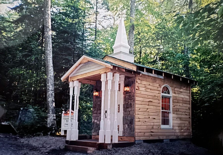 The miniature church in its original location on John Van Buiten's driveway. It was modeled after the chapel of his childhood. 