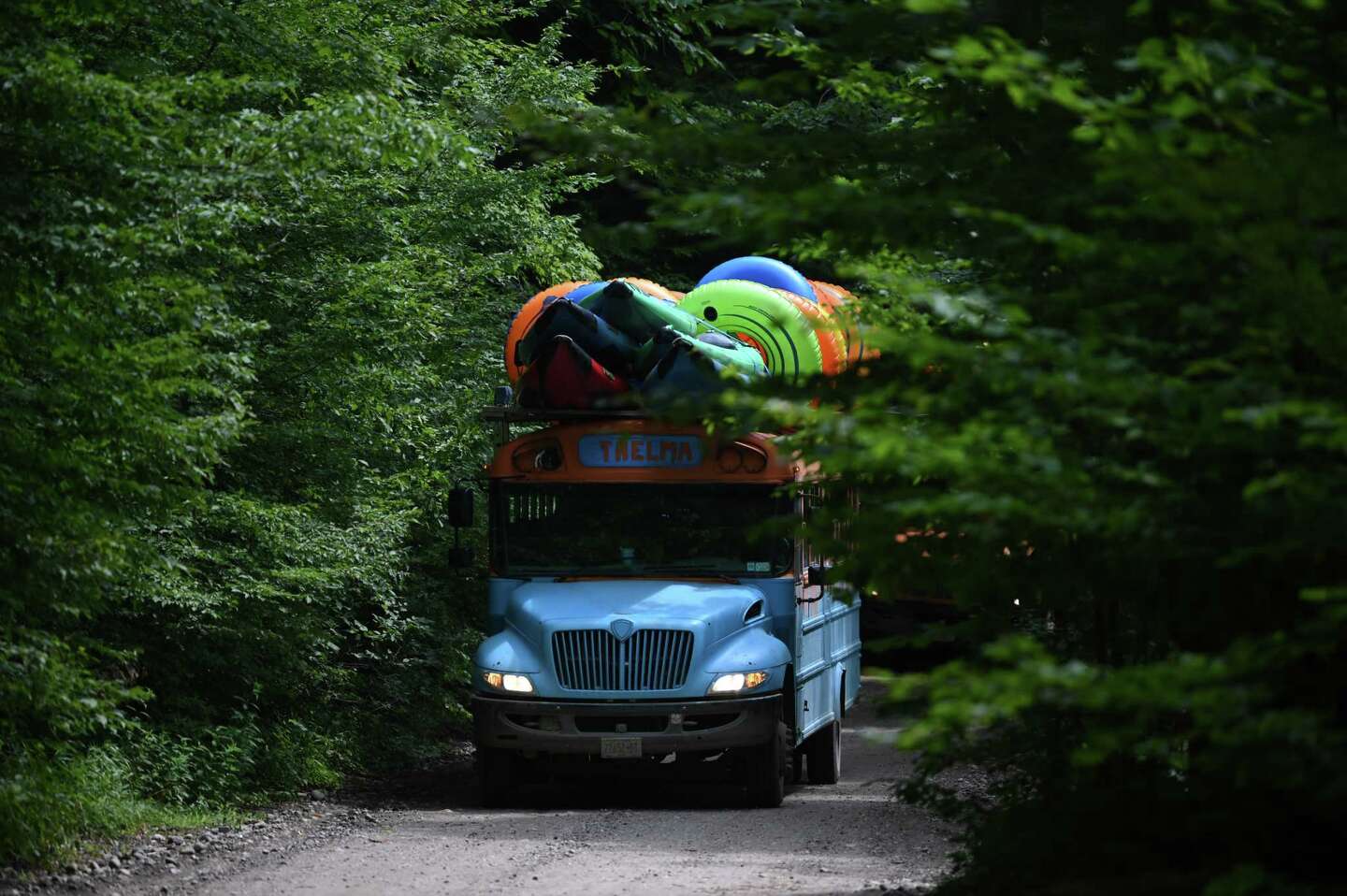 A river-float tour bus drives up River Road on Friday, Aug. 2, 2024, in Warrensburg