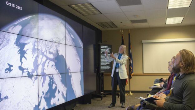 Dr. Claire Parkinson describes some of her research on our planet's changing ice to the Earth to Sky Academy class of 2019 using Goddard Scientific Visualization Studio imagery projected on the NASA hyperwall.