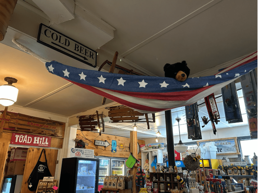 stuffed teddy bear in an american flag hammock