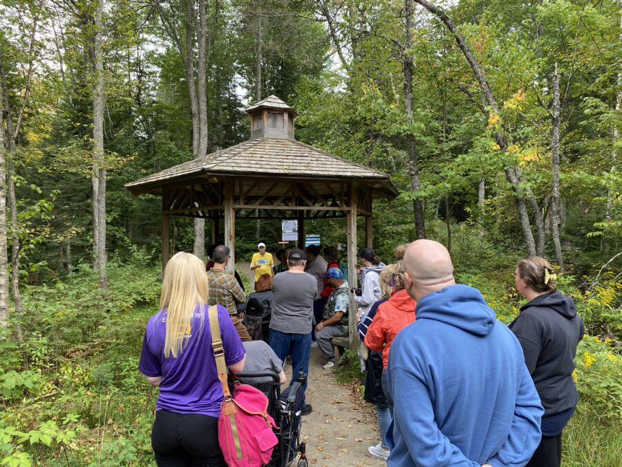 Group gathered at a pagoda at the Barnum Brook trailhead at Paul Smith's VIC.