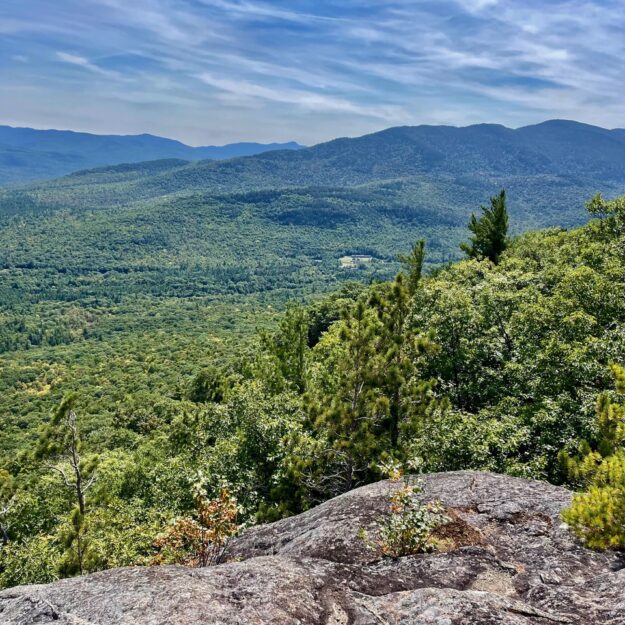 The Sentinels and behind them the Hurricane Wilderness from Flume Knob.