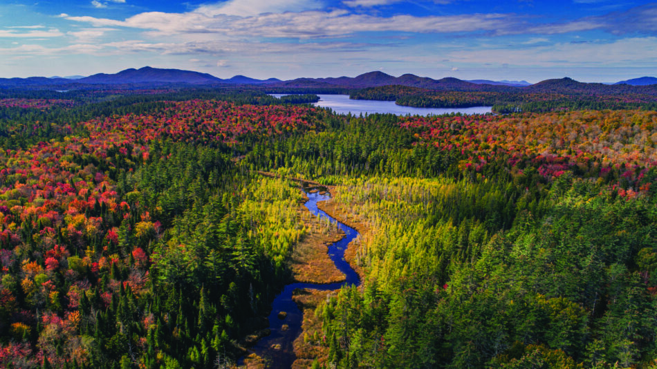 An aerial photo of the Adirondack Park in the fall